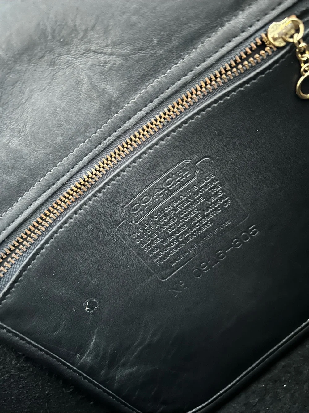 Coach Black Leather Messenger Bag with Gold Hardware